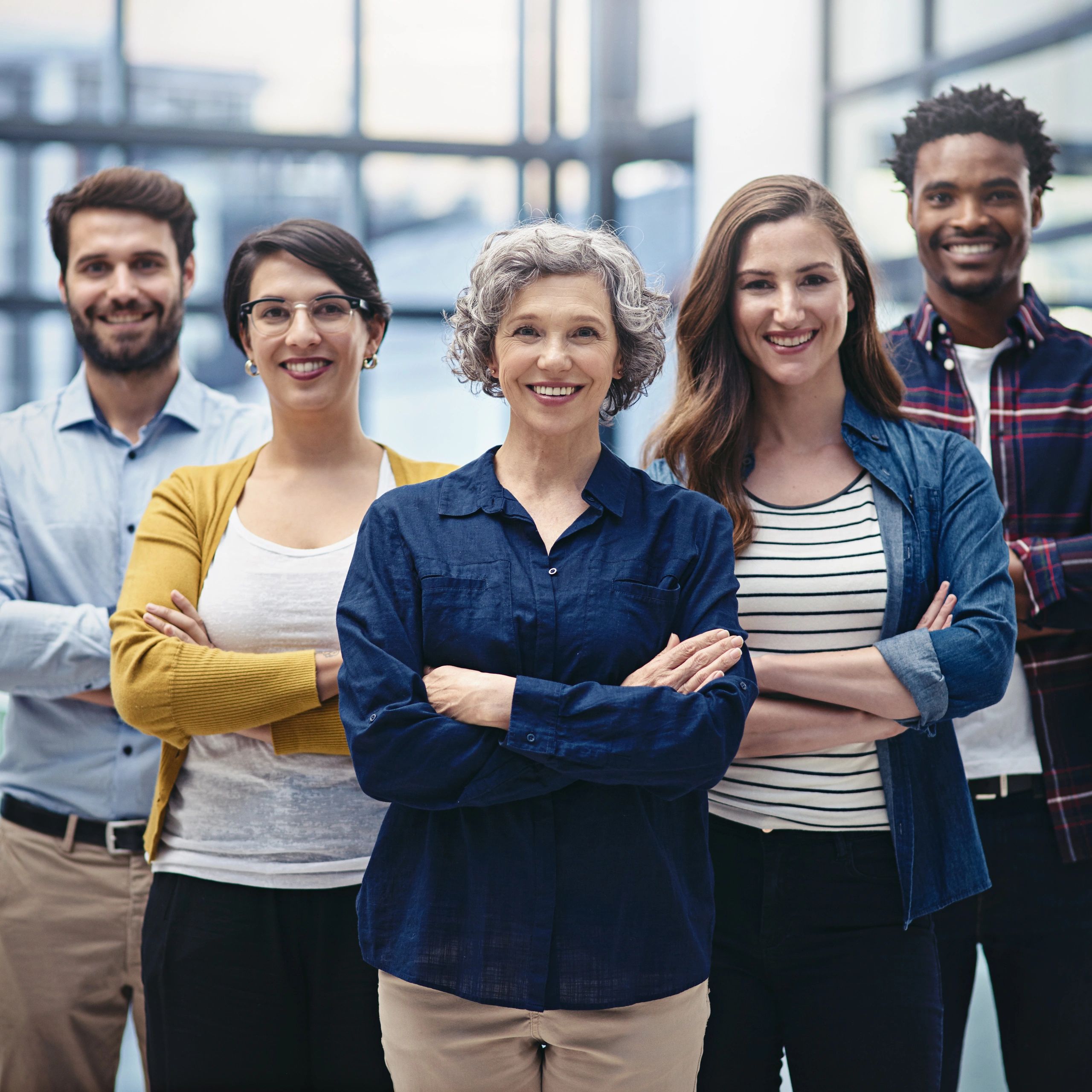 Business team standing together in an office