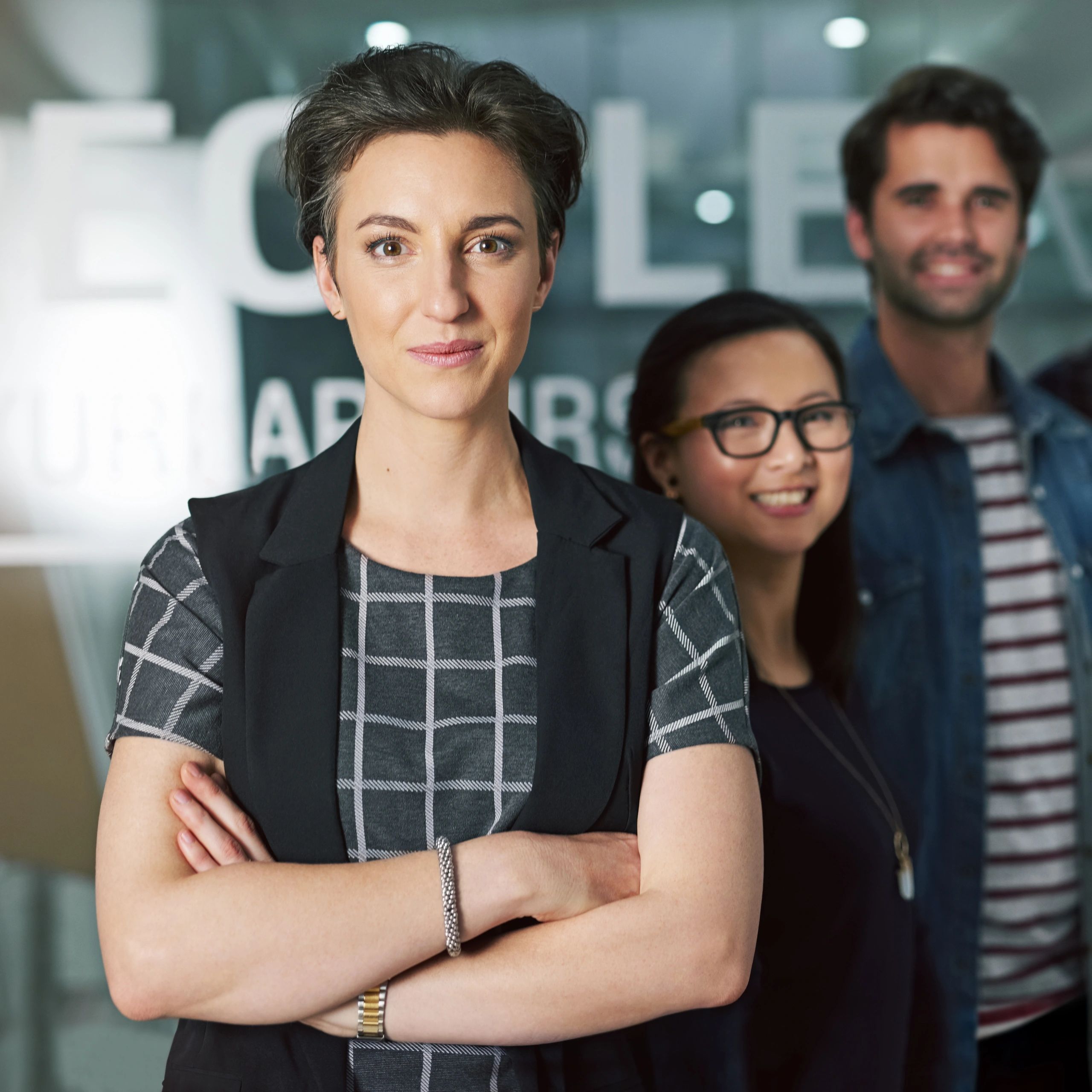 Consulting team portrait in office setting